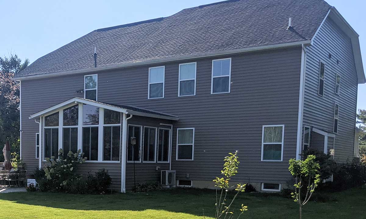 Sunroom with siding that matches house