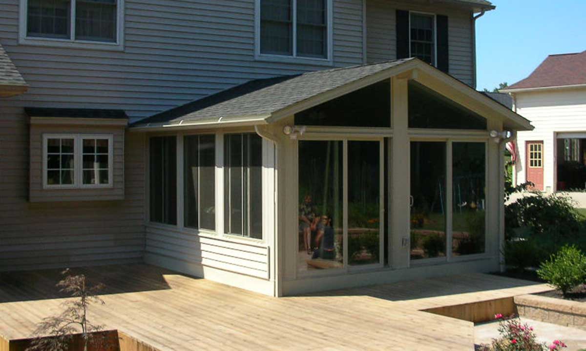 Sunroom with matching siding