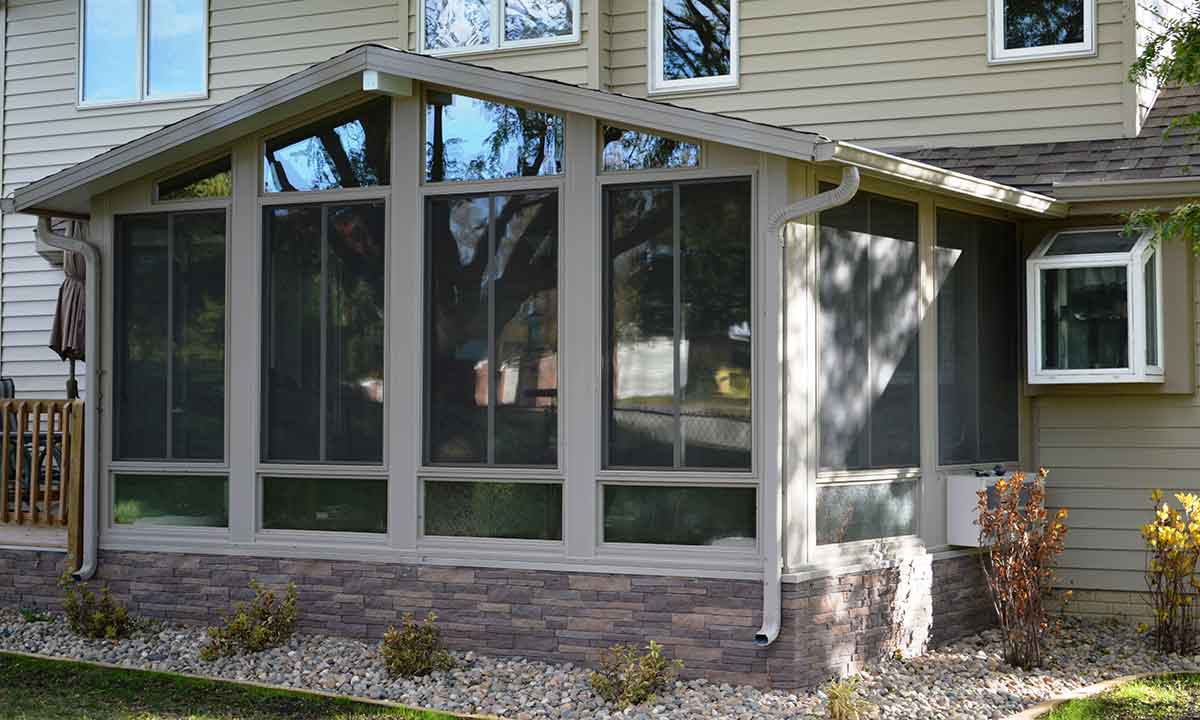 Sunroom with matching colors to home